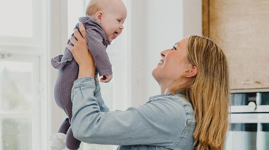 Woman with baby born through egg donor treatment 