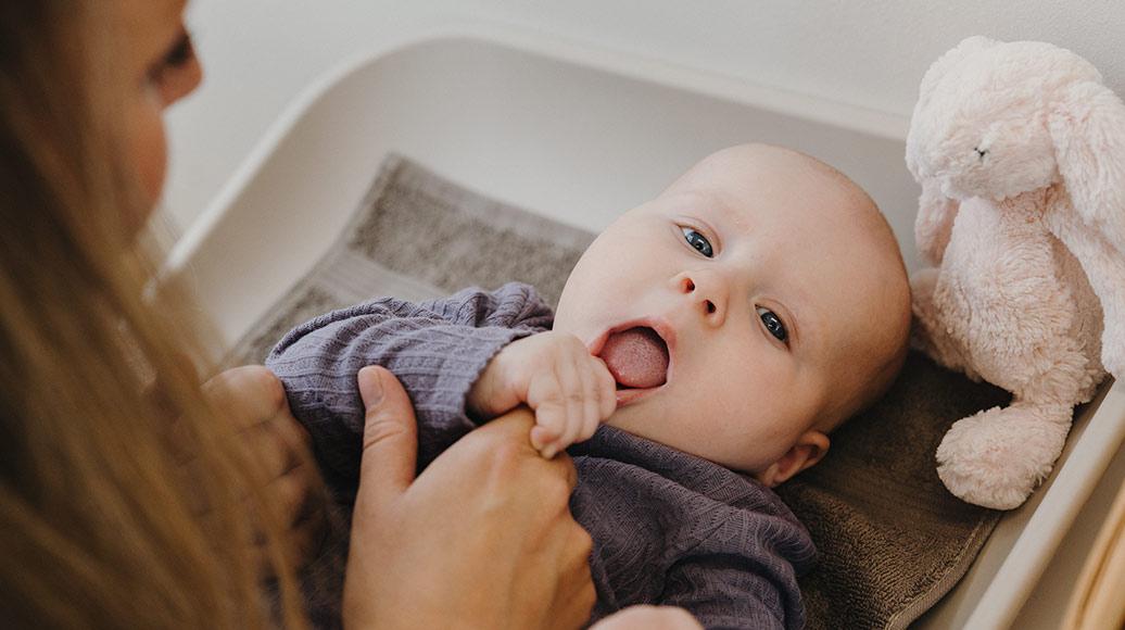 Baby with mother in nursery station